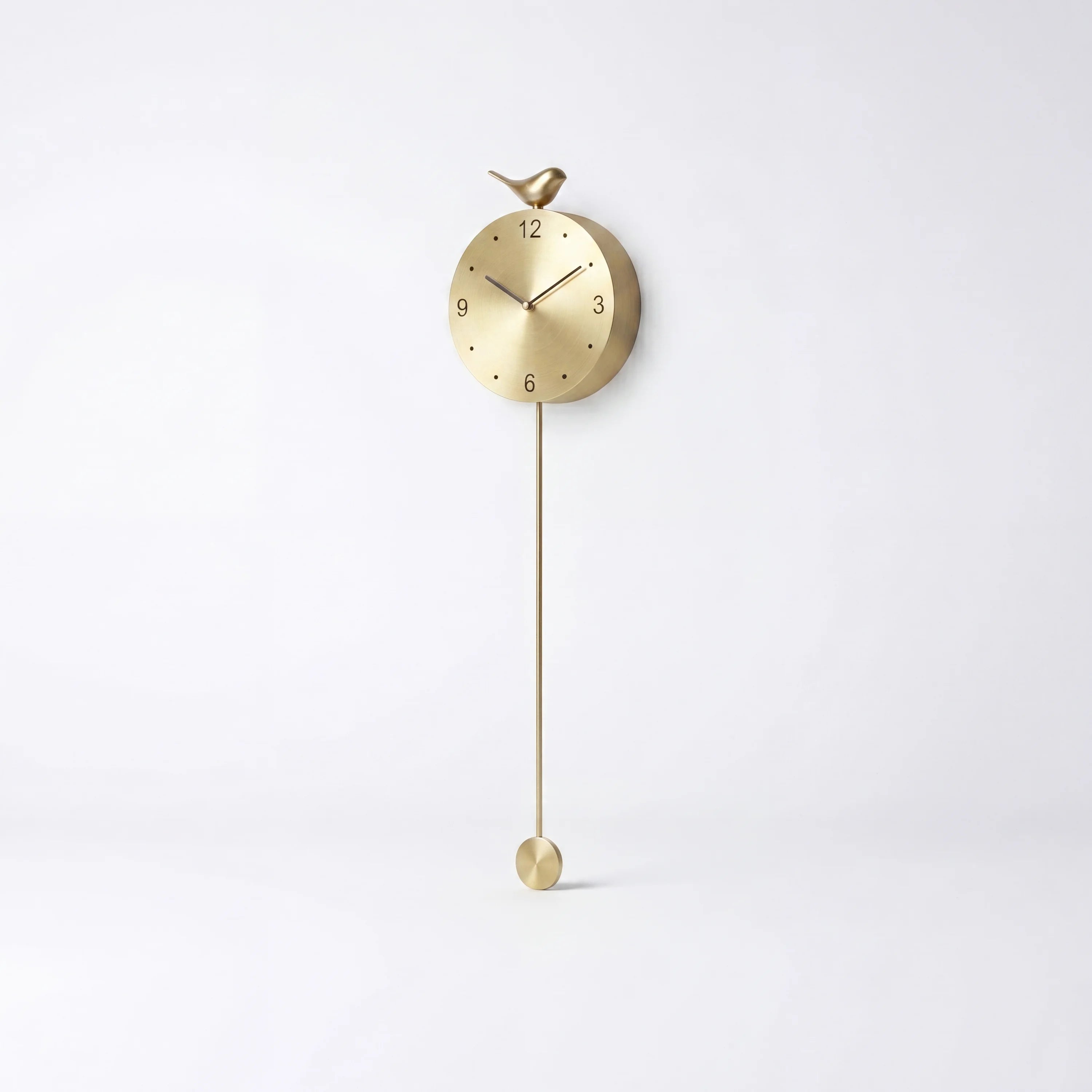 Gold pendulum wall clock | Wyntham