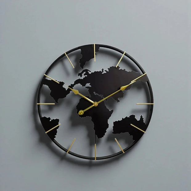 World Map Wall Clock - Harmonie features a black metal frame with cut-out continents, gold clock hands, and hour markers, offering a modern yet vintage style for any room.